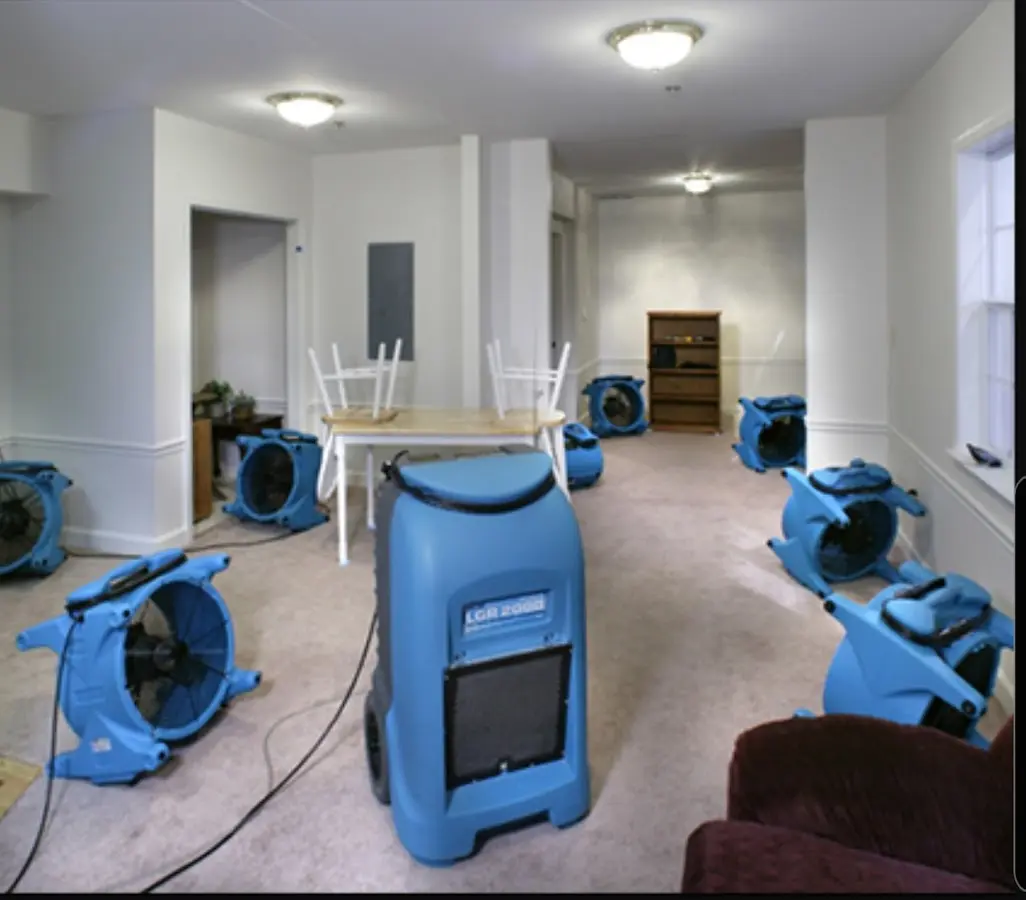 Air movers and dehumidifier setup for Water Extraction & Removal in Coffeyville